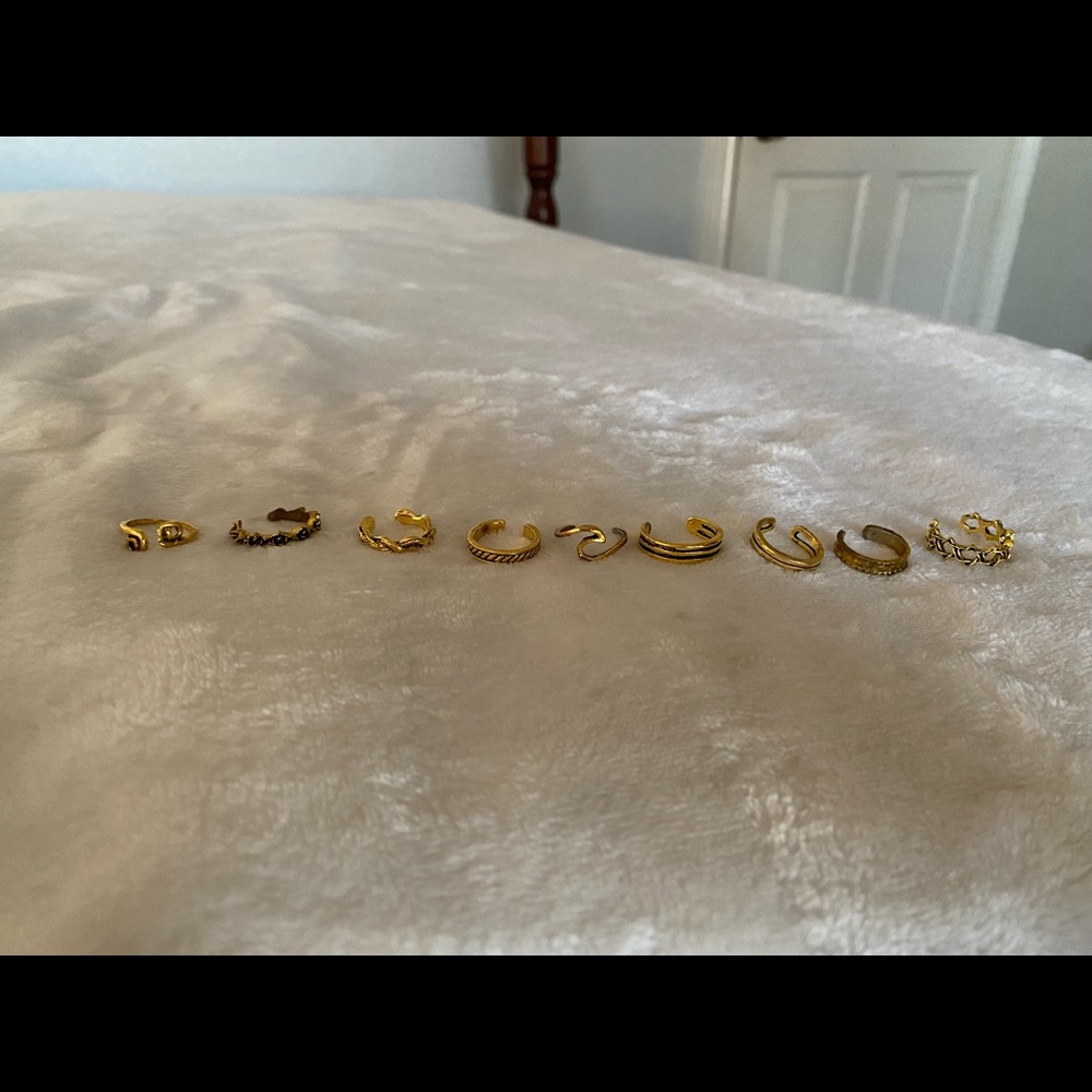 Assorted gold toe rings